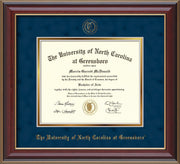 Image of University of North Carolina Greensboro Diploma Frame - Cherry Lacquer - w/Embossed Seal & Name - Navy Suede on Gold mat